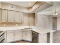 Modern kitchen featuring stone countertops, stainless steel appliances, and updated fixtures at 11890 Tevare Ln # 1097, Las Vegas, NV 89138