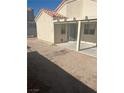 Backyard area with an outdoor seating area and dirt at 1805 Monte Alban Dr, North Las Vegas, NV 89031