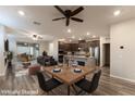 A large, open-concept living room connects seamlessly to the dining area and kitchen, perfect for modern living at 361 Black Turnstone Ct, Las Vegas, NV 89138