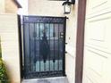 Wrought iron security gate with decorative design at 3999 Delos Dr, Las Vegas, NV 89103