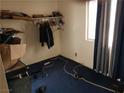 Bedroom with blue carpet at 4200 Coran Ln, Las Vegas, NV 89108
