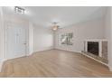 Inviting living room with cozy fireplace, ceiling fan, and a bright, airy atmosphere at 6704 Indian Chief Dr # 101, Las Vegas, NV 89130