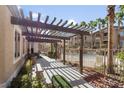 Community pergola provides shade for walking along the grounds at 8805 Jeffreys St # 2002, Las Vegas, NV 89123