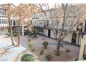 Exterior of building with gravel landscaping and mature trees at 2080 Karen Ave # 21, Las Vegas, NV 89169