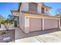 Charming two-story home featuring a two-car garage, a walkway, and a front yard at 2180 Maple Shade St, Henderson, NV 89002
