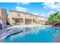 Backyard pool with a built-in spa and covered patio at 4063 Lower Saxon Ave, North Las Vegas, NV 89085