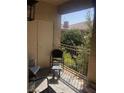 Cozy balcony offers an intimate outdoor retreat with stylish seating and privacy at 3850 Juno Beach St # 203, Las Vegas, NV 89129