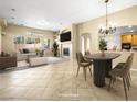 Spacious living room featuring fireplace, ample seating, and bright natural light at 6360 Bullring Ln, Las Vegas, NV 89130