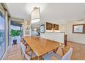 Inviting dining room featuring views and a stylish light fixture at 3111 Bel Air Dr # 7D, Las Vegas, NV 89109