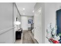 Inviting entryway with neutral walls, recessed lighting, and decorative accents leading to the main living areas at 10313 Aragon Crown Rd, Las Vegas, NV 89135