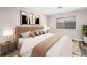 Warm bedroom featuring a luxurious bed with gold accents and a view to the trees outside the window at 2851 S Valley View Blvd # 1150, Las Vegas, NV 89102