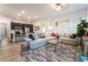 Spacious living room with recessed lighting, tile floors, and comfortable seating at 905 Belleforte Ln, Las Vegas, NV 89138
