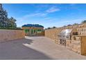 Outdoor kitchen with a built in stainless steel BBQ grill and countertop space at 9103 Alta Dr # 102, Las Vegas, NV 89145
