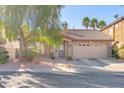 Charming single-story home with a well-manicured yard and inviting curb appeal at 10113 Walhalla Plateau Ct, Las Vegas, NV 89148