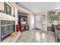 Inviting living room featuring a fireplace and ample natural light at 10113 Walhalla Plateau Ct, Las Vegas, NV 89148