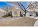 Lovely single-story home featuring a well-manicured xeriscape front yard for effortless maintenance and water savings at 2517 New Salem Ave, Henderson, NV 89052