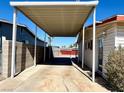 Covered carport providing ample space for parking vehicles and storage at 4964 Dunkirk Ave, Las Vegas, NV 89121