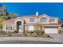 Charming two-story home with a well-maintained front yard at 7624 Nocturne Ct, Las Vegas, NV 89128