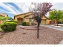 Charming single-story home with desert landscaping, featuring a two-car garage at 8233 Valley Stream Ave, Las Vegas, NV 89131