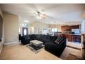 Open-concept living room showcases tile floors, high ceilings, and a fireplace at 2823 Landau Ct, Henderson, NV 89074