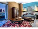 Inviting bedroom features hardwood floors, balcony and nice views at 360 E Desert Inn Rd # 407, Las Vegas, NV 89109