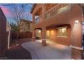 Relaxing covered backyard patio area, perfect for outdoor entertaining or enjoying the fresh air at 10858 La Florentina Ave, Las Vegas, NV 89166