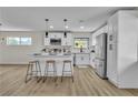 Bright kitchen with white cabinetry, stainless appliances, and a center island perfect for entertaining at 2211 Frontier Ave, Las Vegas, NV 89106