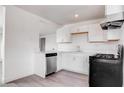 Bright kitchen with stainless steel dishwasher and ample countertop space at 501 National St, Henderson, NV 89015