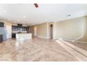 Open-concept living space features tile floors and lots of natural light at 5648 Alitak Bay St, North Las Vegas, NV 89081