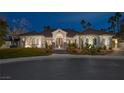 Beautiful single-story home featuring a tile roof and a custom metal entry gate at 8211 Windsor Crest Ct, Las Vegas, NV 89123