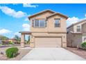 Charming two-story home with a neutral color palette and a convenient two-car garage at 108 Fiery Hill Ave, Henderson, NV 89011