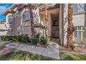 Inviting exterior view featuring manicured landscaping, and a well-maintained walkway to the front entrance at 108 Lemon Glaze St # 202, Las Vegas, NV 89145