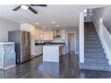 Modern kitchen with white cabinetry, stainless steel appliances, and a large island at 1416 Swanbrooke Dr, Las Vegas, NV 89144