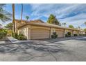 View of the garages showcasing ample parking space and well-maintained surroundings of the property at 2050 W Warm Springs Rd # 2922, Henderson, NV 89014