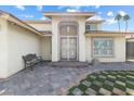 Close up of the home's entrance showing a bench at 6775 Segura Dr, Las Vegas, NV 89103