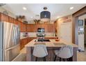 Spacious kitchen with stainless steel appliances, granite countertops and ample cabinet space at 7815 Red Rock Ridge Ave, Las Vegas, NV 89179
