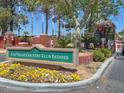Las Vegas Country Club Estates entrance sign with brick accents and manicured landscaping at 3111 Bel Air Dr # 20D, Las Vegas, NV 89109
