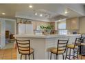 Bright kitchen featuring breakfast bar seating, ample cabinet space, and plenty of counter space at 3600 Pierida St # 201, Las Vegas, NV 89108