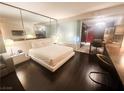 Open floor plan featuring a king bed, seating area, and modern finishes at 4381 W Flamingo Rd # 2109, Las Vegas, NV 89103