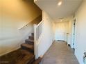Neutral entryway showcasing stairs leading to the upper level at 538 Ylang Pl, Henderson, NV 89015