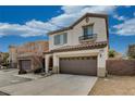 Two-story stucco home boasting a tile roof, green shutters, and a two car garage at 7530 Brisa Del Mar Ave, Las Vegas, NV 89179
