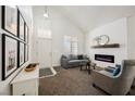 Inviting living room with a fireplace, plush seating, and stylish design at 841 Glitter Glen Ct, Las Vegas, NV 89123