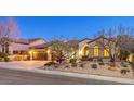 Charming single-story home featuring a three-car garage and beautiful desert landscaping at 1809 Prichard Ave, Henderson, NV 89052