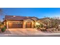 Lovely single-story home featuring a two-car garage and beautifully xeriscaped front yard at 1809 Prichard Ave, Henderson, NV 89052