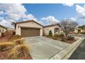 Lovely single-story home with spacious driveway and two-car garage in a well-kept neighborhood at 4459 Lavender, Pahrump, NV 89061