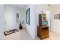 Inviting entryway featuring neutral-colored tile flooring and modern decor at 4012 Shetland Pony St, Las Vegas, NV 89122