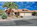 Charming home with a well-manicured yard and mature trees providing shade, showcasing great curb appeal at 7724 Clearwood Ave, Las Vegas, NV 89123
