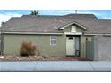 Inviting front entrance with a charming door and well-maintained exterior at 9721 Meadowville Ave, Las Vegas, NV 89129