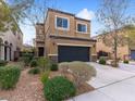 Well-manicured front yard with green shrubs and trees adding curb appeal to the house at 3719 Gilmore Creek St, Las Vegas, NV 89129