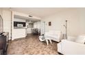 Living room includes a sofa, coffee table, and TV, creating a cozy and inviting atmosphere at 5162 S Jones Blvd # 108, Las Vegas, NV 89118
